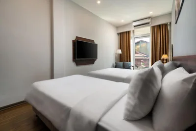 阳台四人间 — Astoria Hanoi Hotel & Travel